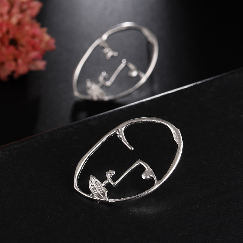 Abstract Stylish Hollow Out Face Dangle Earrings Girls Statement Drop Earrings Statement Earrings A04 - SixtyKey new model design Dubai fashion style 2021 best price